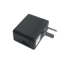 Fuente Switching 5V 2A 10W. Cargador de baterías para dispositivos portátiles. USB incorporado.  Color Negro.